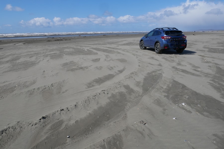 Car on the beach in Ocean Shores